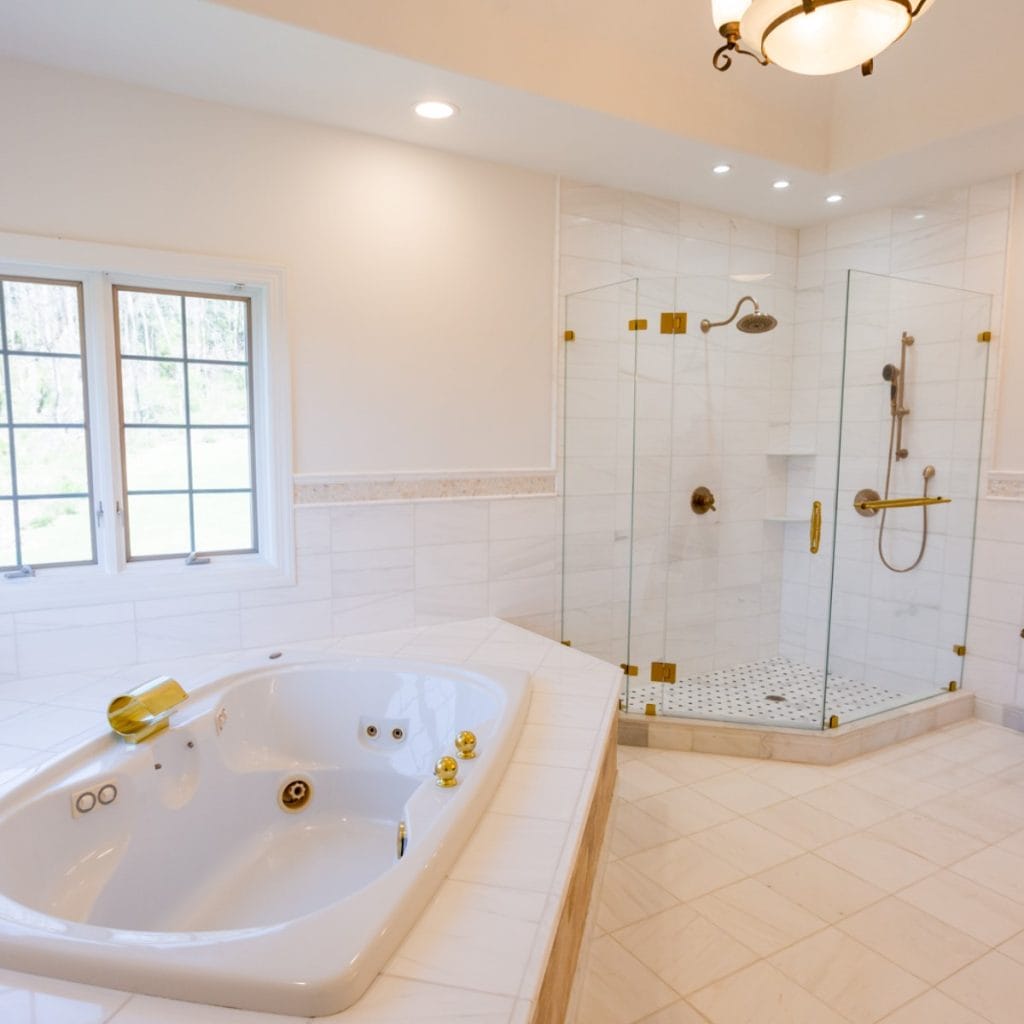 brand new frameless shower door and bathroom.